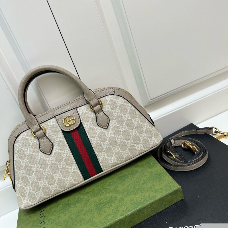 G*u*i top handle bags